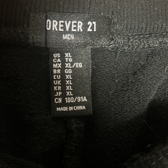 Stylish black joggers with faux zippers - Picture 4 of 5